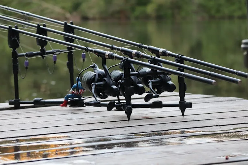 Carp fishing bivvy set up on a lakeside bank for overnight angling session